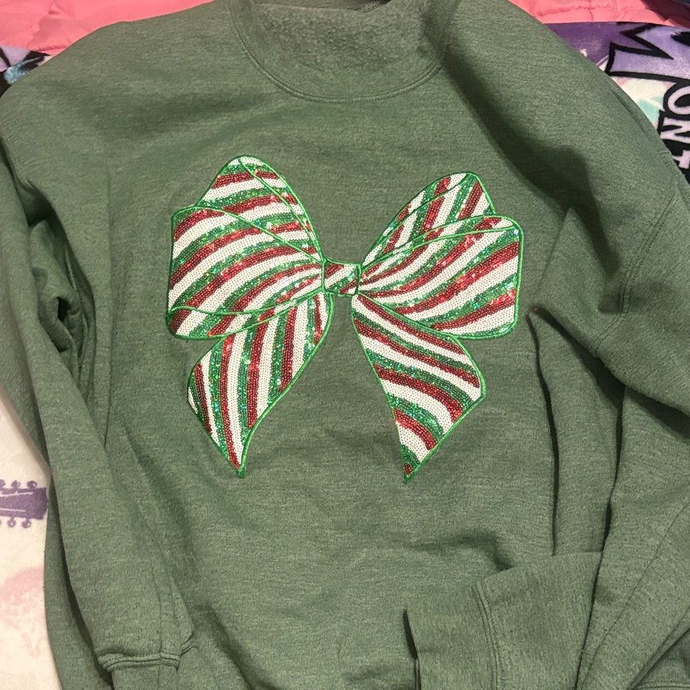 Green Sweatshirt with Festive Bow Design